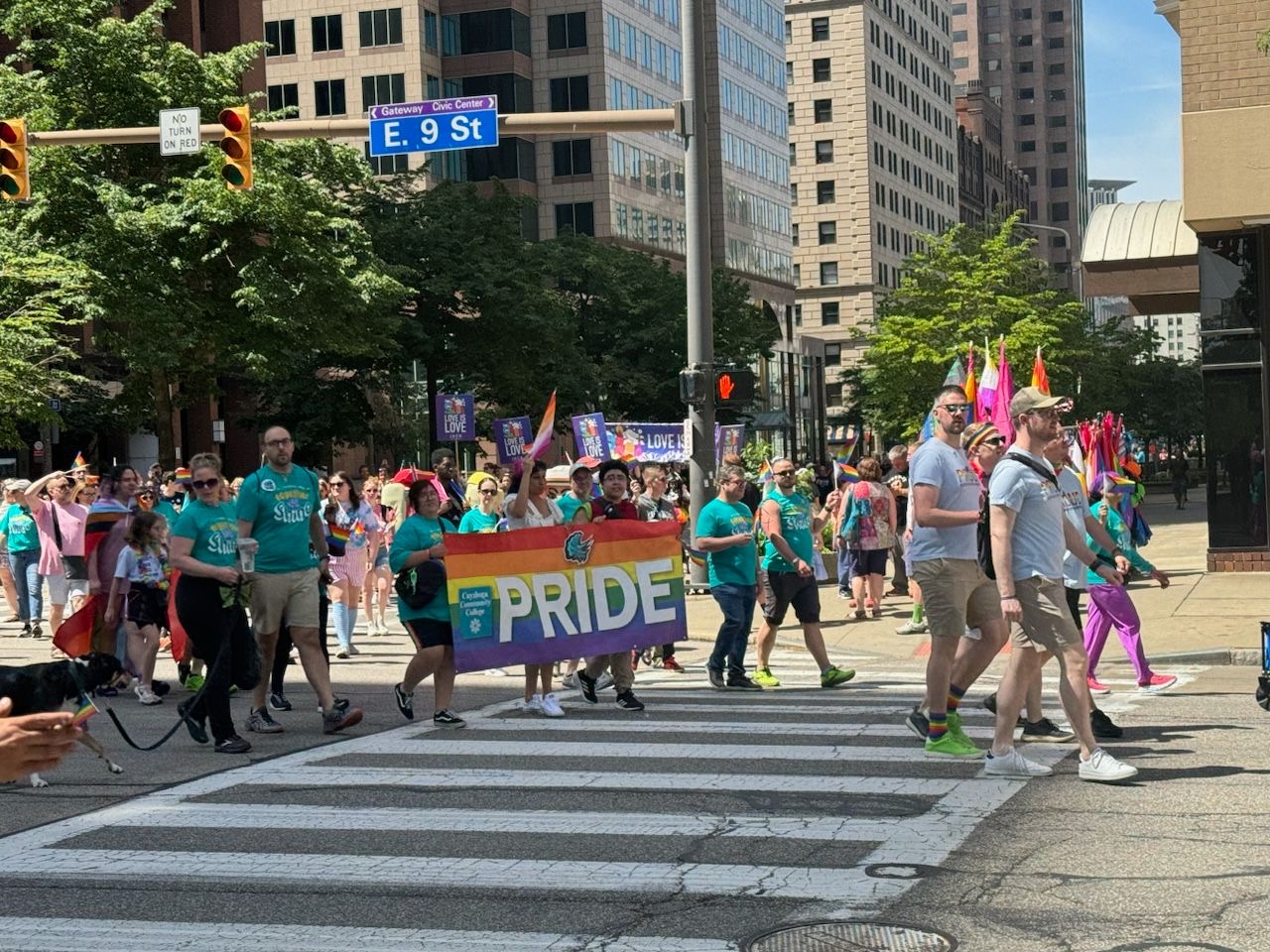 Students with the Tri-C pride banner at CLE Pride 2024