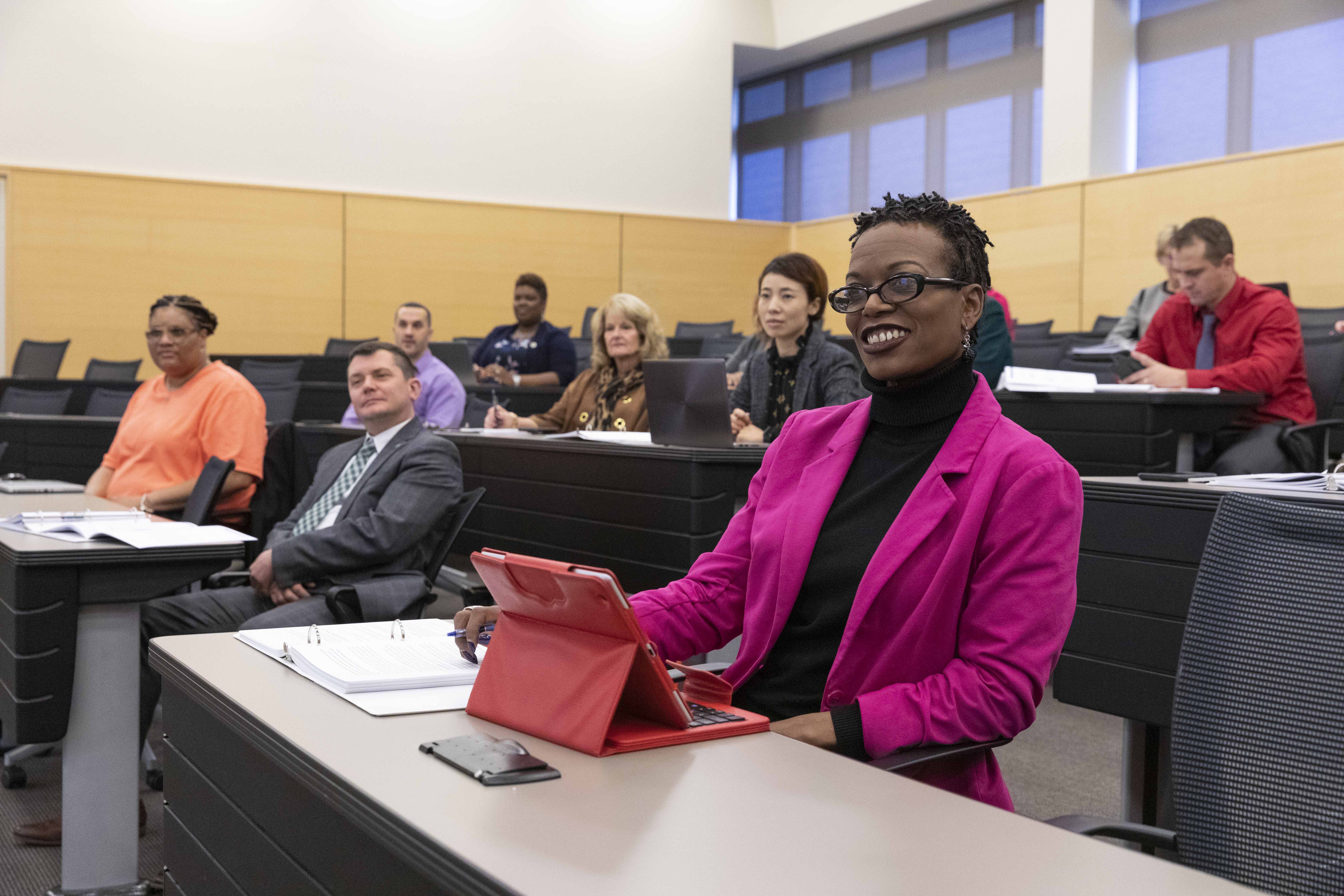 Image of people in a lecture hall.