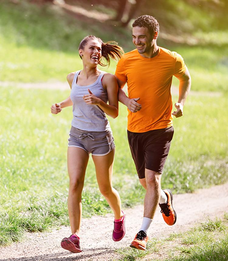 Two people running outdoors