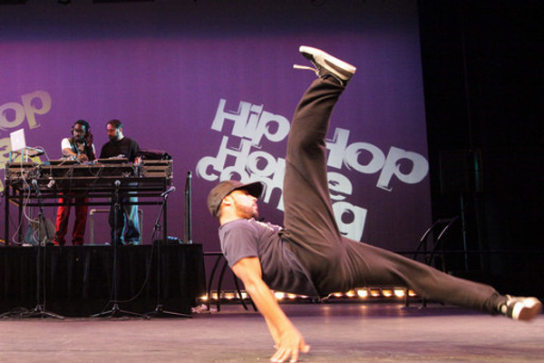 b-boy performing a windmill on stage