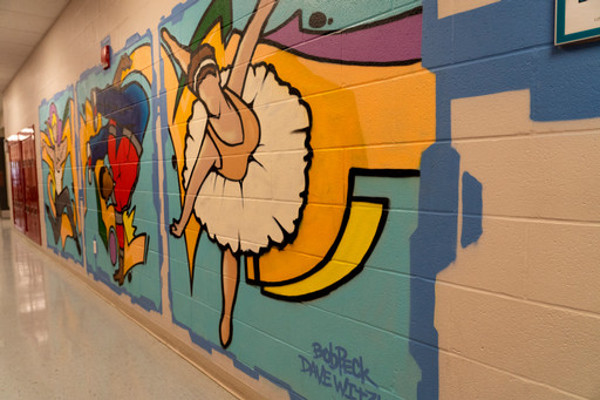 ballet dancer painting in hallway